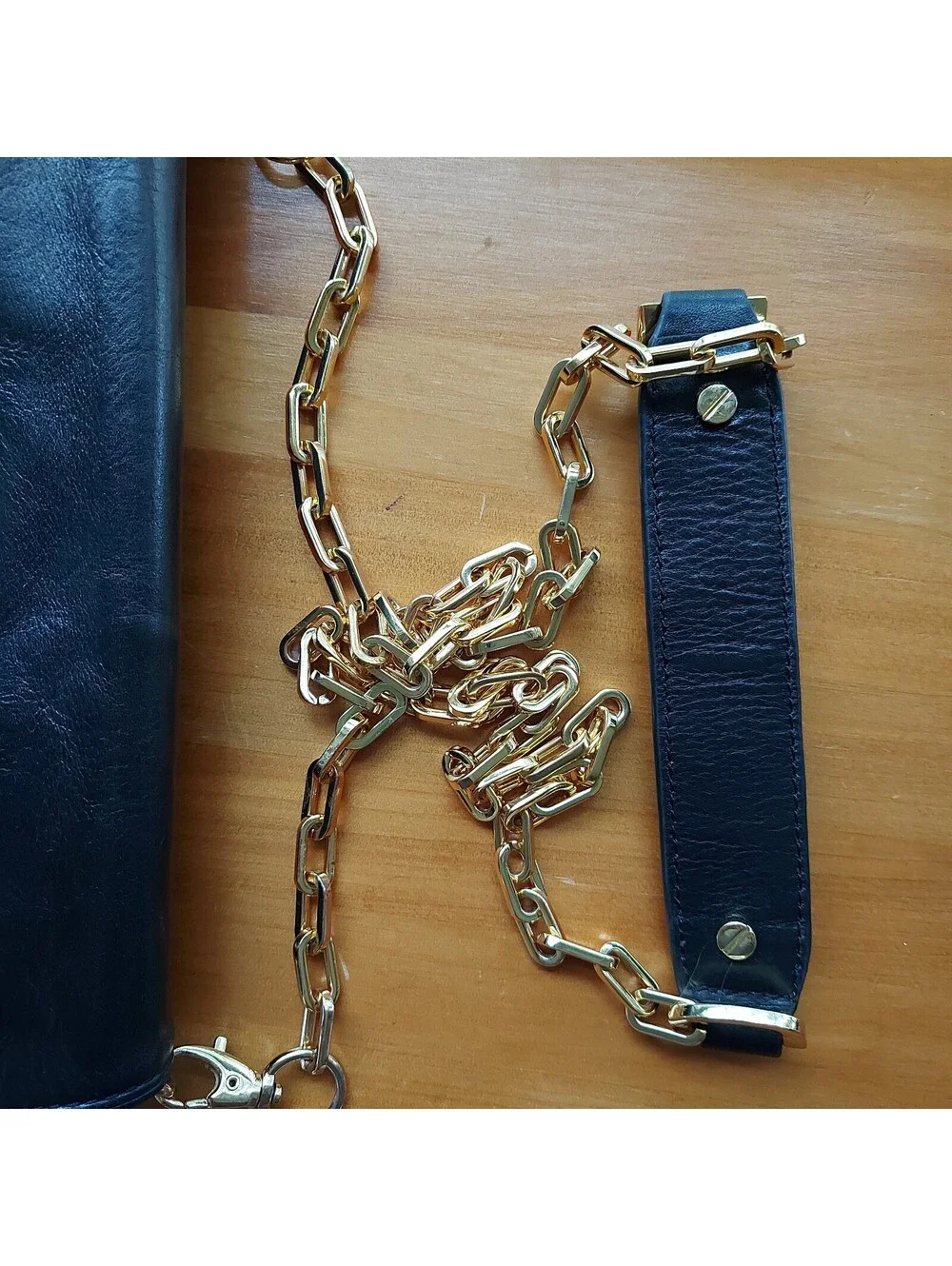 Tory Burch Reva black leather clutch bag